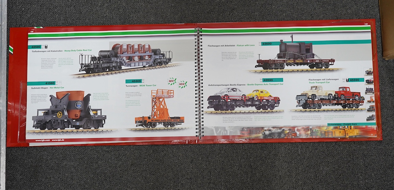 A collection of boxed Lehmann LGB and Piko G scale items including; a Piko Bahnhof Rosenbach Station (62040), a box of curved track sections (1600), a Hauptsignal (5092), Vorsignal (5091), level crossing (5065), driving